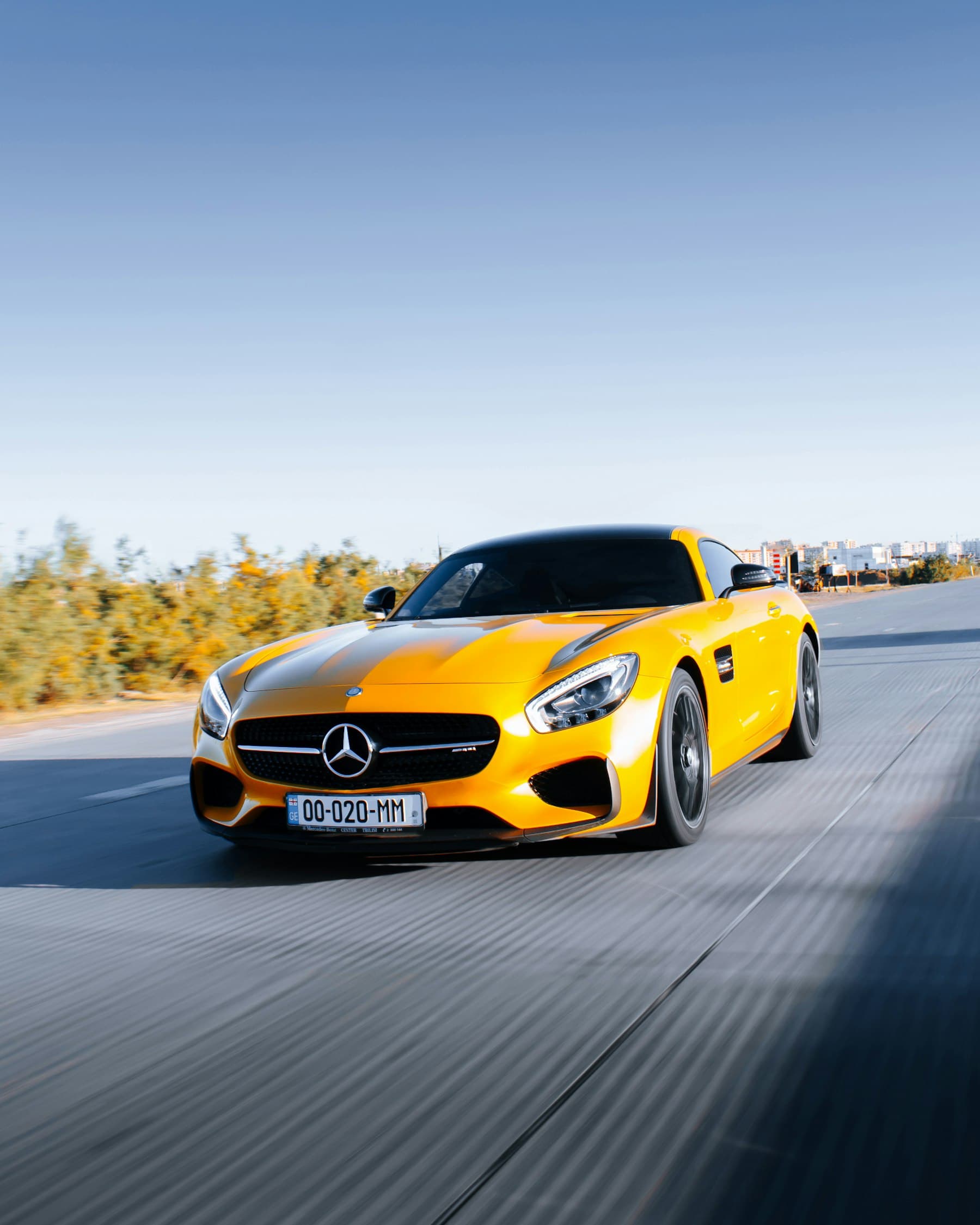 Mercedes-AMG GT with gloss PPF in a dark studio.