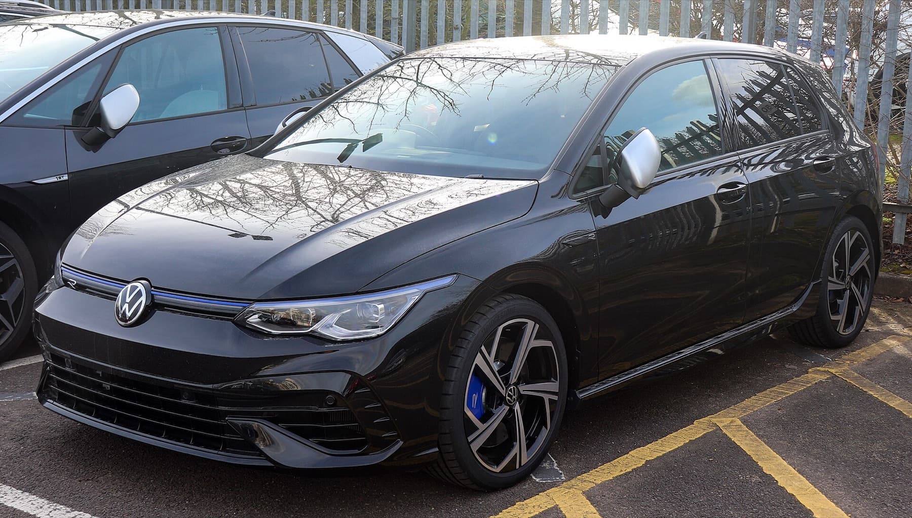 Volkswagen Golf R after front PPF, three-quarter front view.